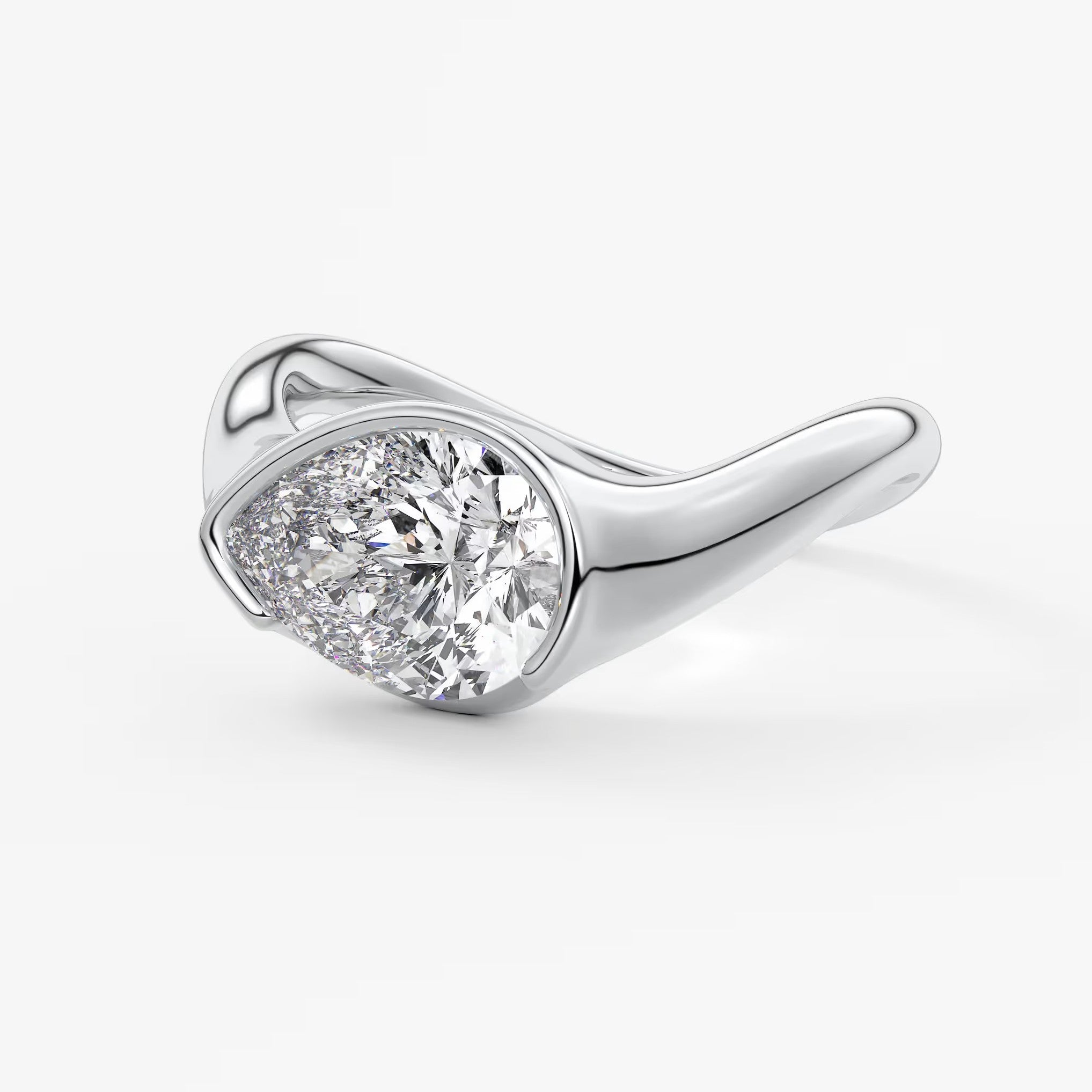 Lyra – east-west half bezel pear engagement ring