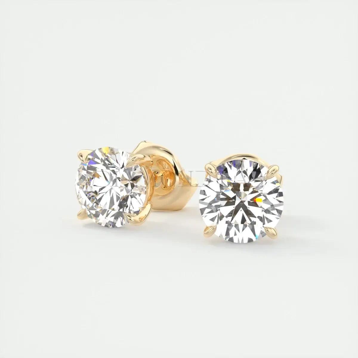 14k yellow gold diamond stud earrings.