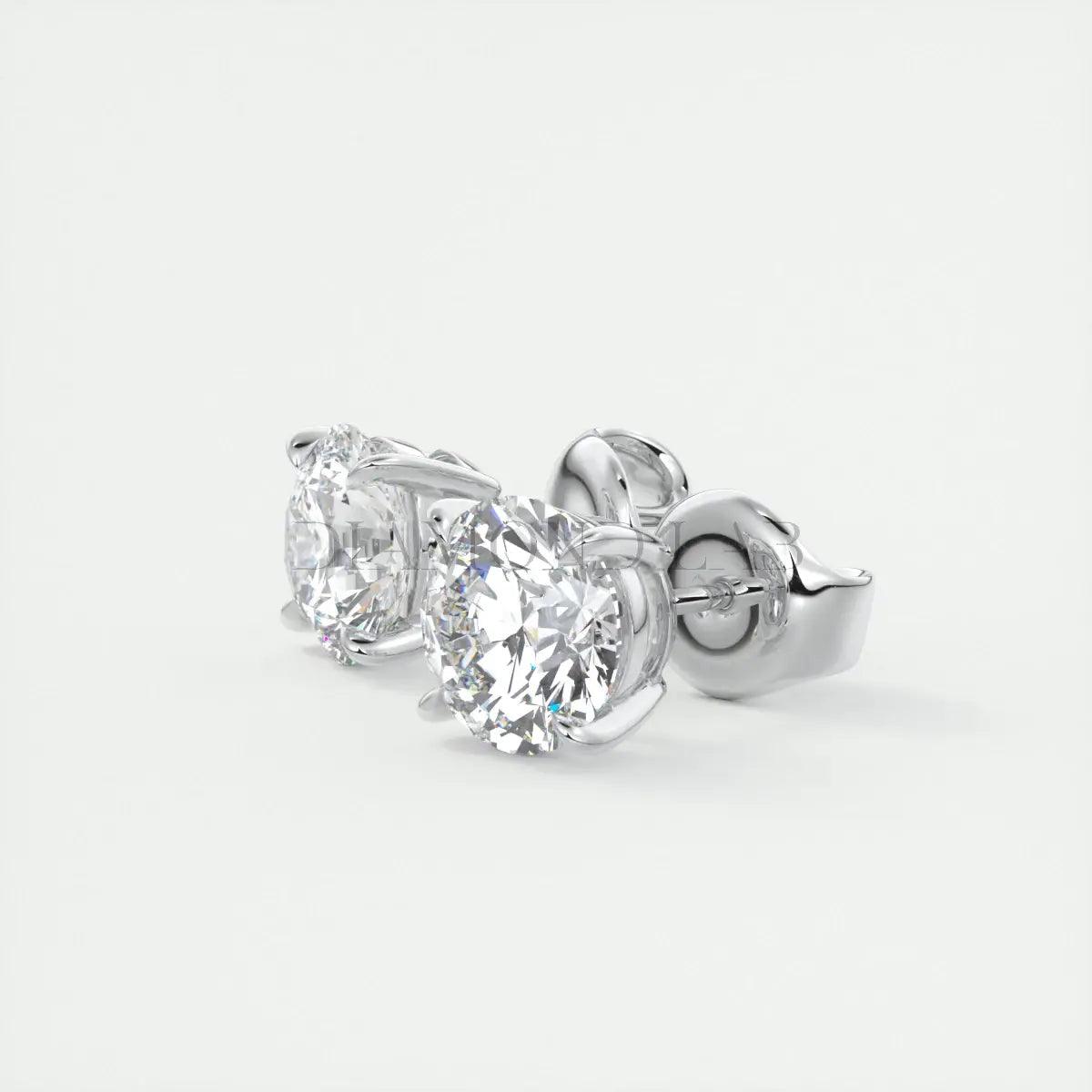 18k white gold diamond stud earrings.