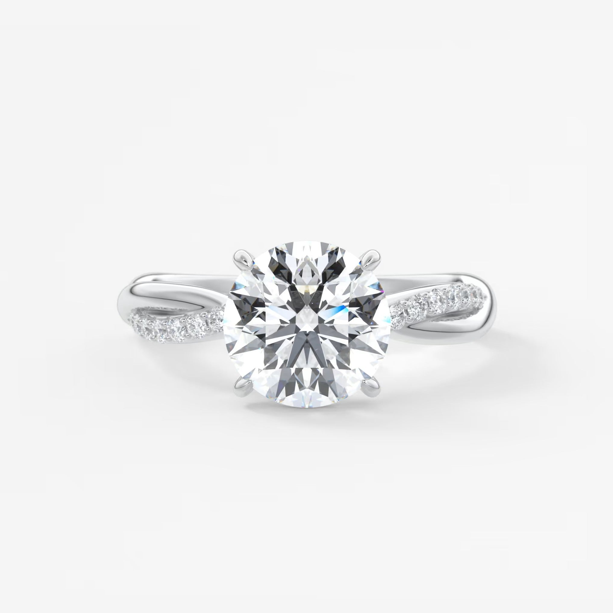 Mirella round twisted pavé engagement ring