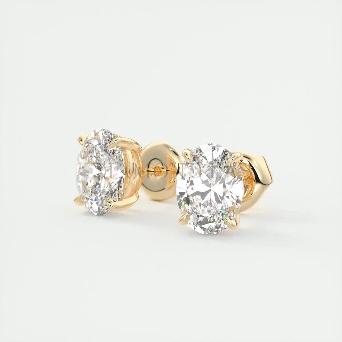 18k yellow gold diamond stud earrings.