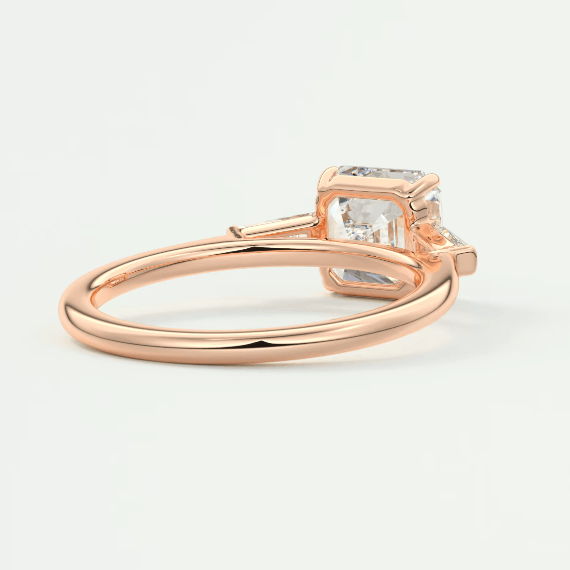 Rose gold princess cut engagement ring with diamond accents