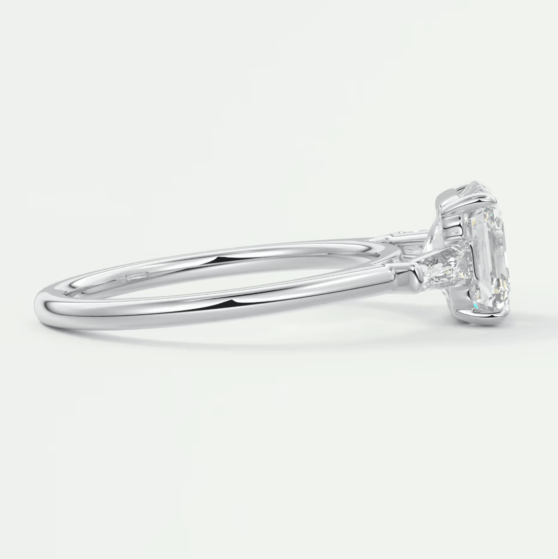 18-karat white gold engagement ring with a marquise-cut diamond.