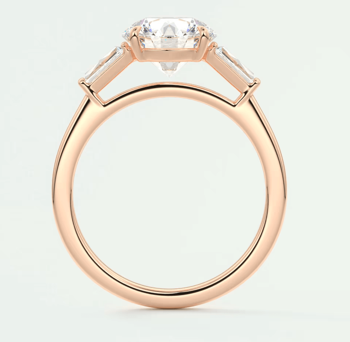 Rose gold diamond engagement ring with baguette accents