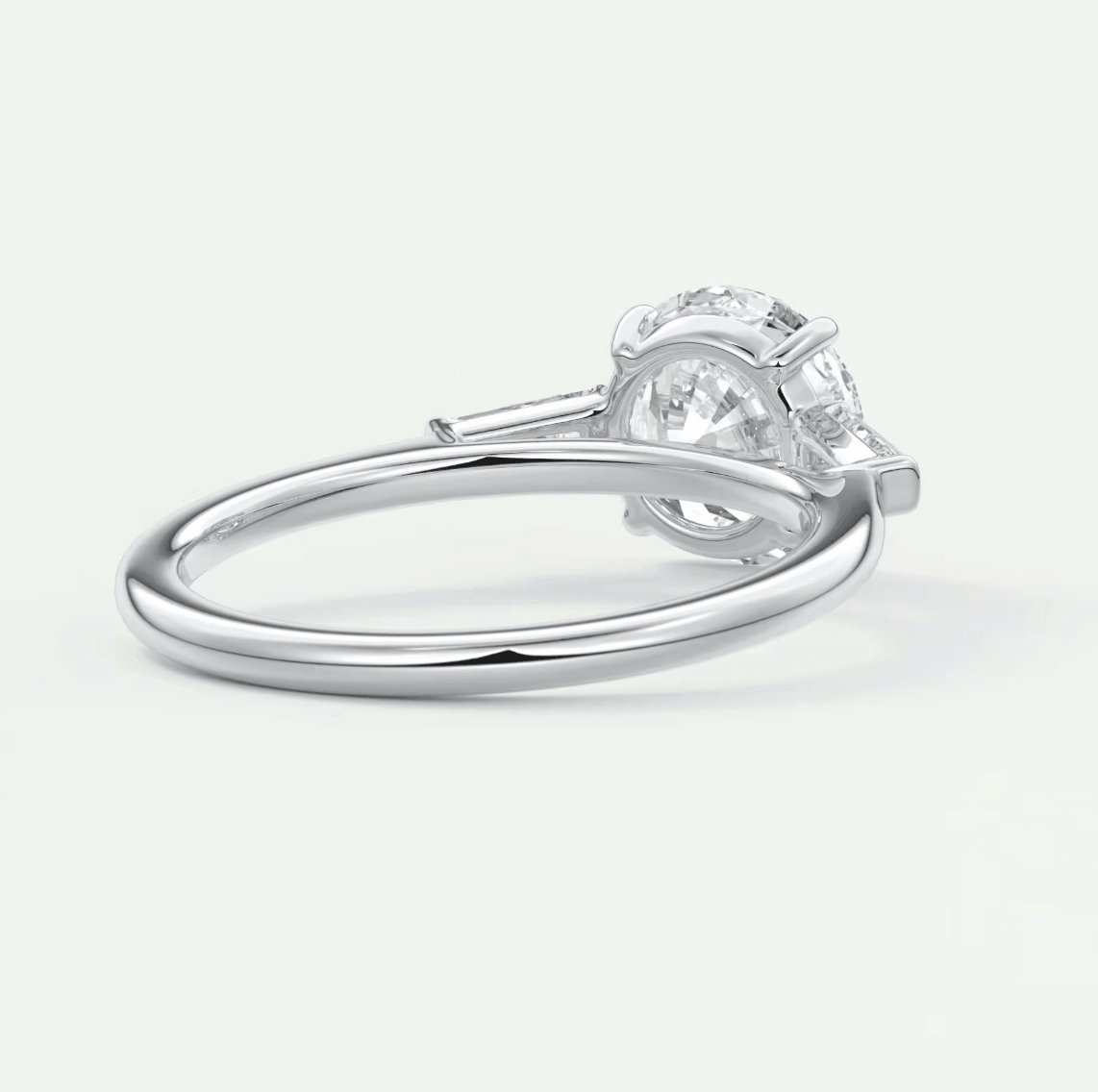 18k white gold solitaire diamond engagement ring with a round brilliant cut gem.