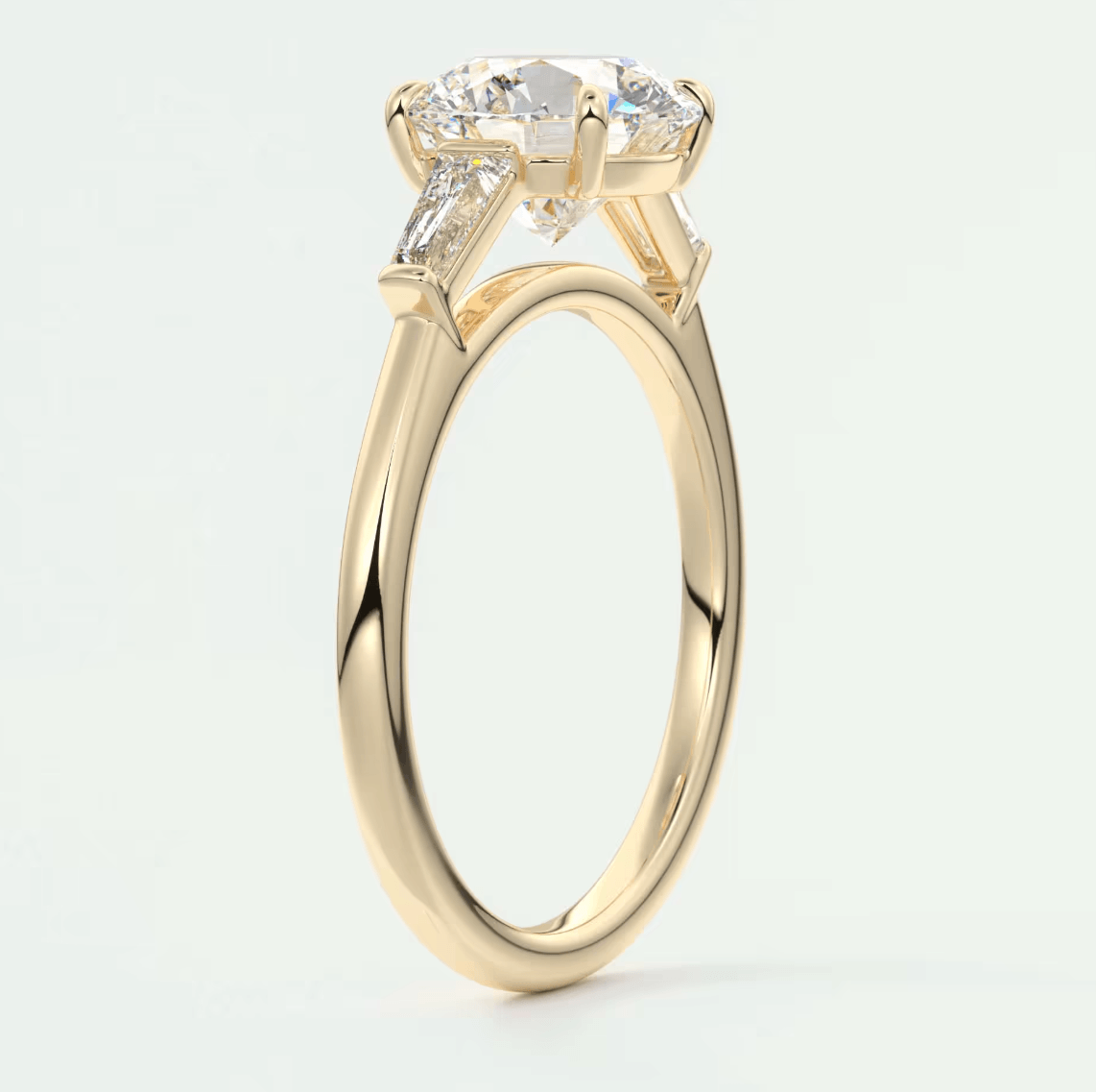 18k yellow gold engagement ring with a princess cut diamond and small side diamonds.