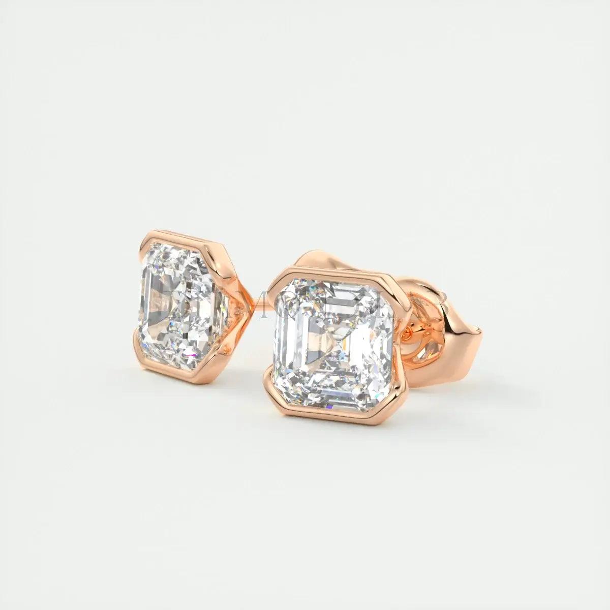 18k rose gold diamond stud earrings with a hexagonal bezel setting.
