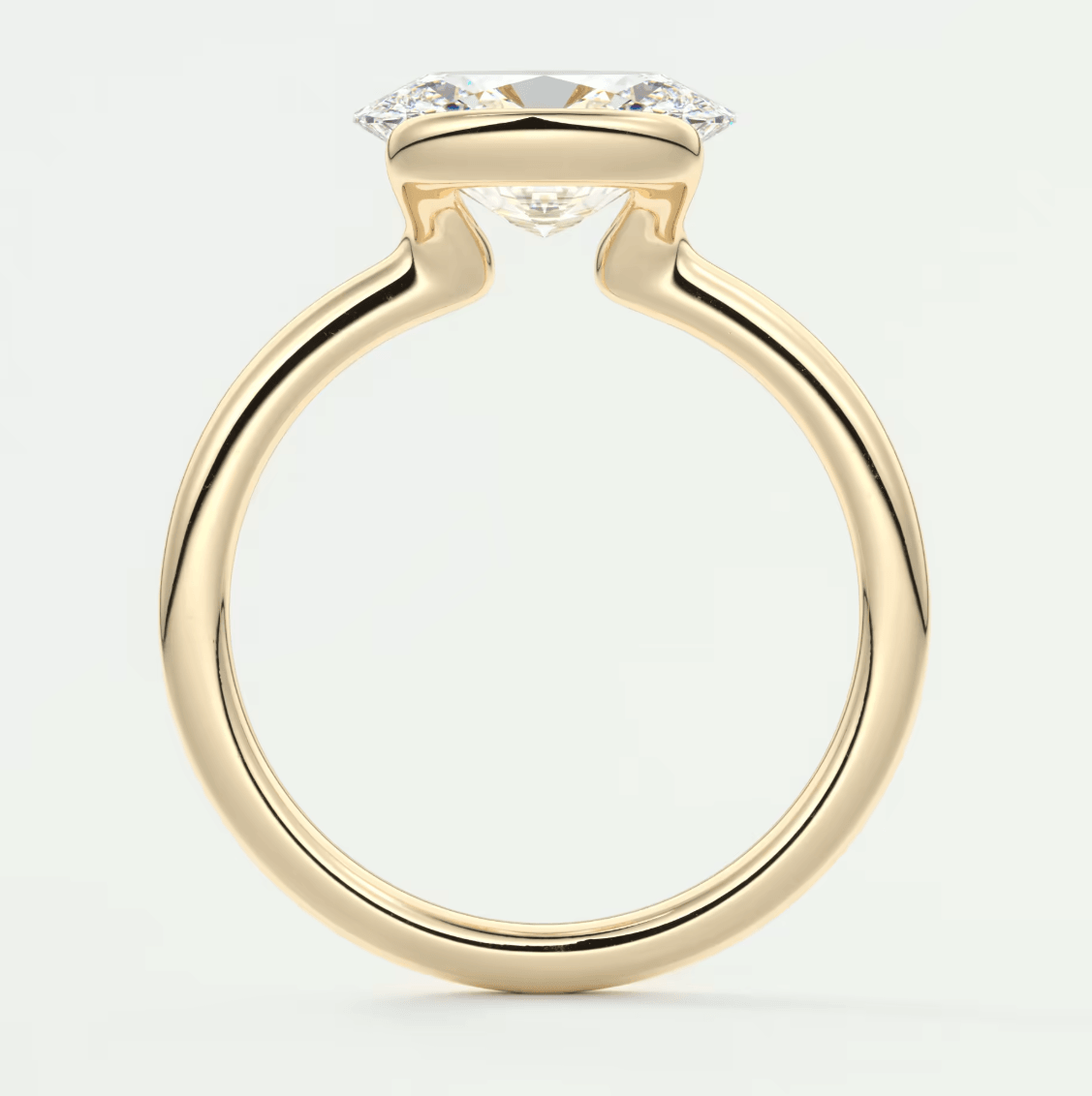18k yellow gold engagement ring with a princess cut diamond.