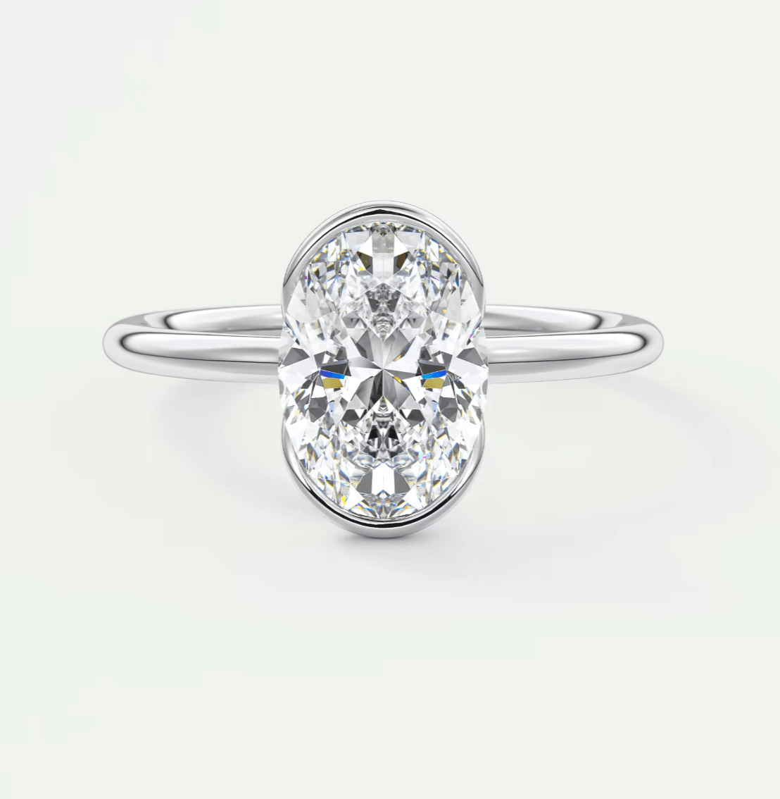 Solara Oval Half Bezel Ring – Lab Diamond or Moissanite
