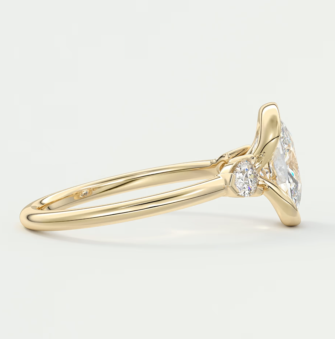 Solara Elongated Cushion Half Bezel Three-Stone Engagement Ring