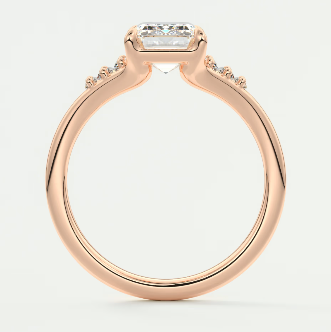 Solena Emerald Split Shank Engagement Ring with Graduated Baguette Side Stones