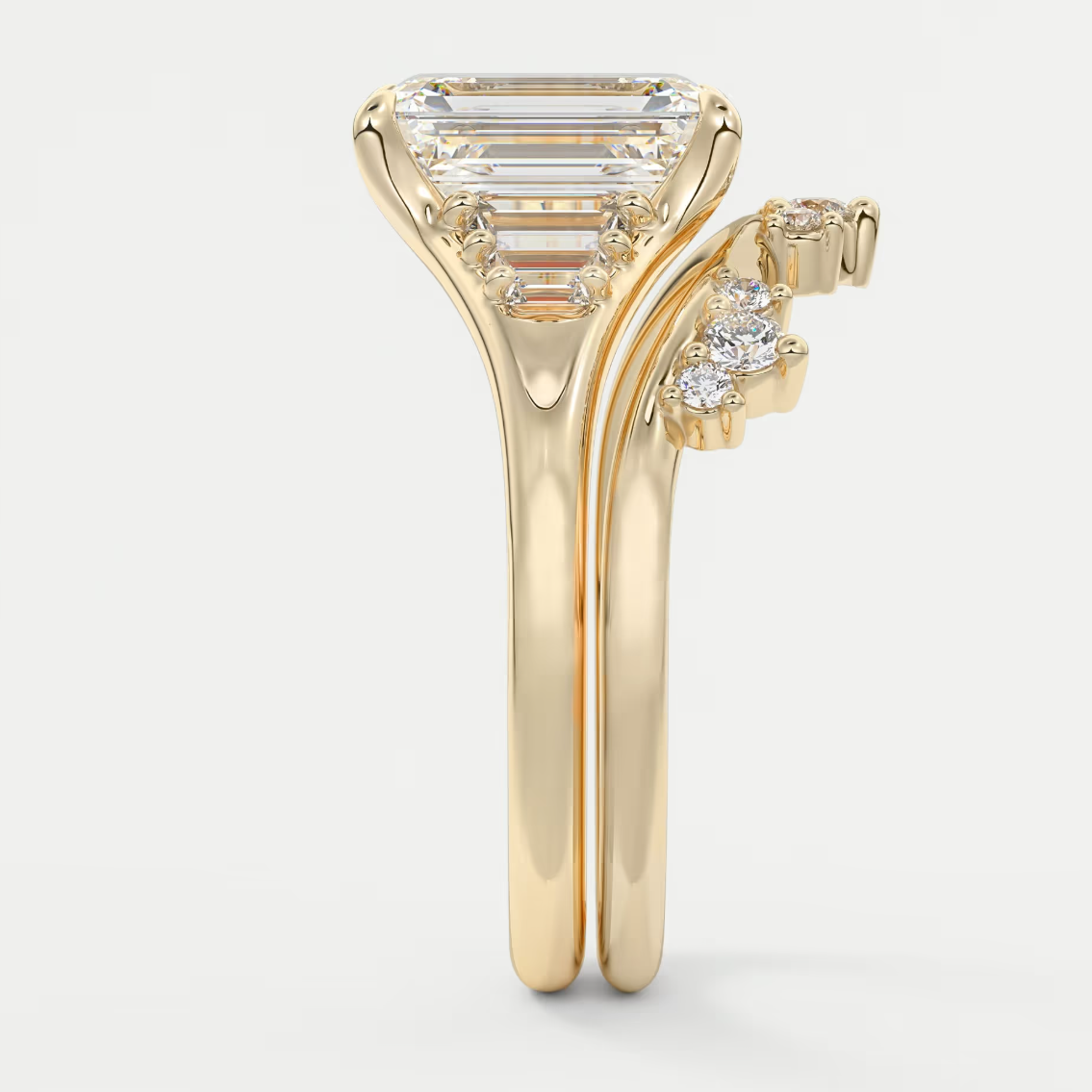 Solena Emerald Split Shank Engagement Ring with Graduated Baguette Side Stones