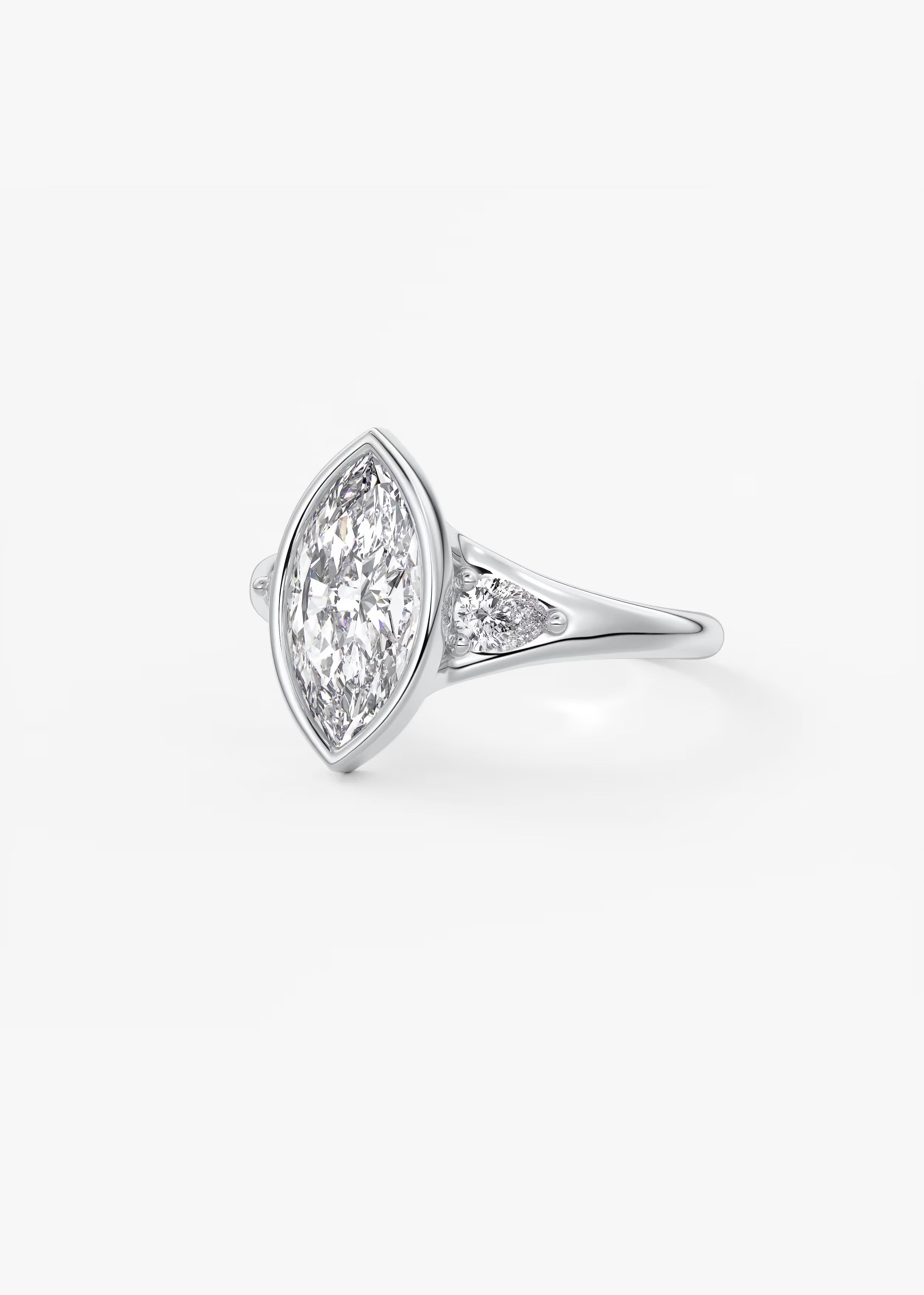 Véda Trilogy – Marquise with Pear Side Stones