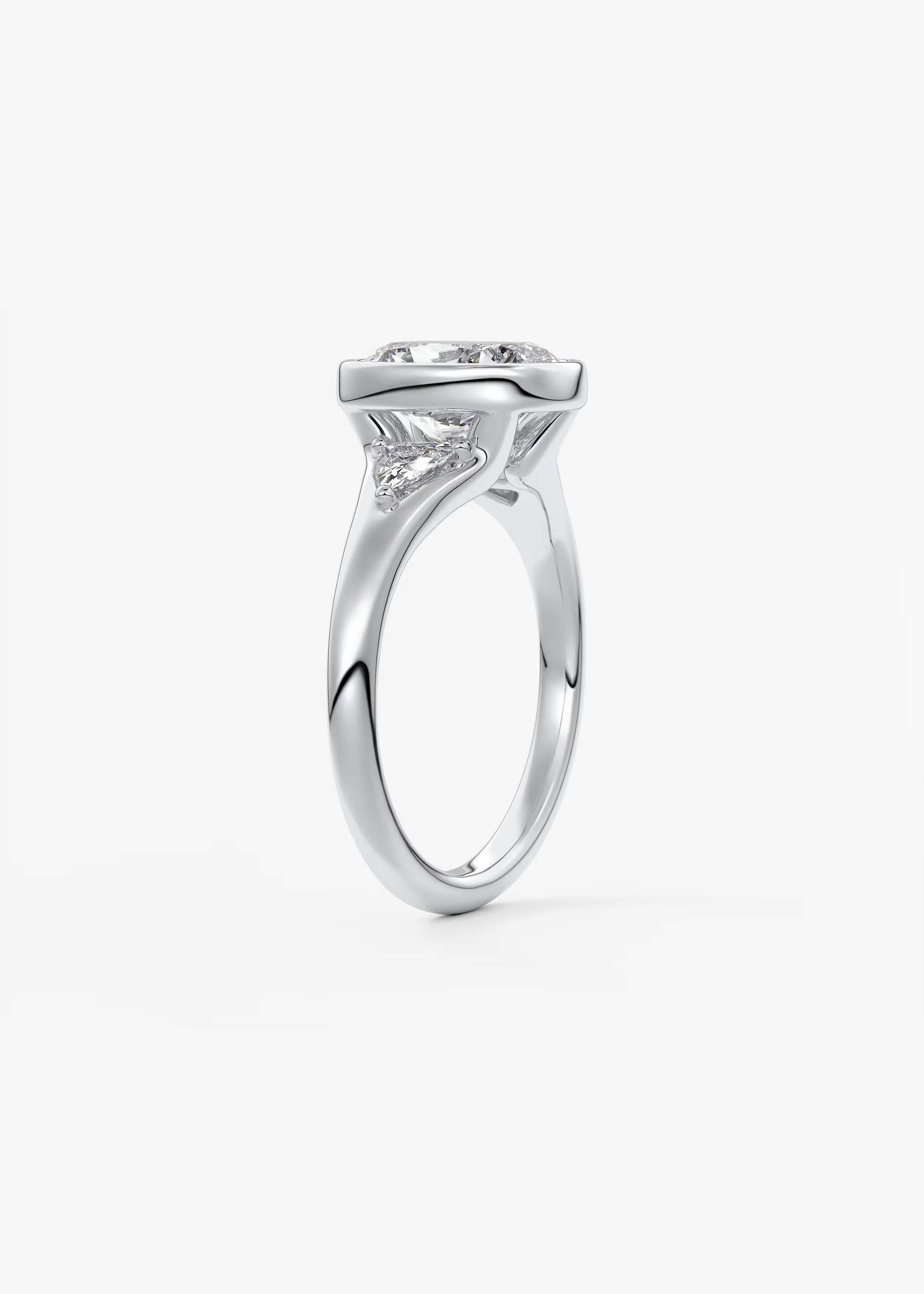 Véda Trilogy – Cushion with Trillion Side Stone Split Shank Engagement Ring