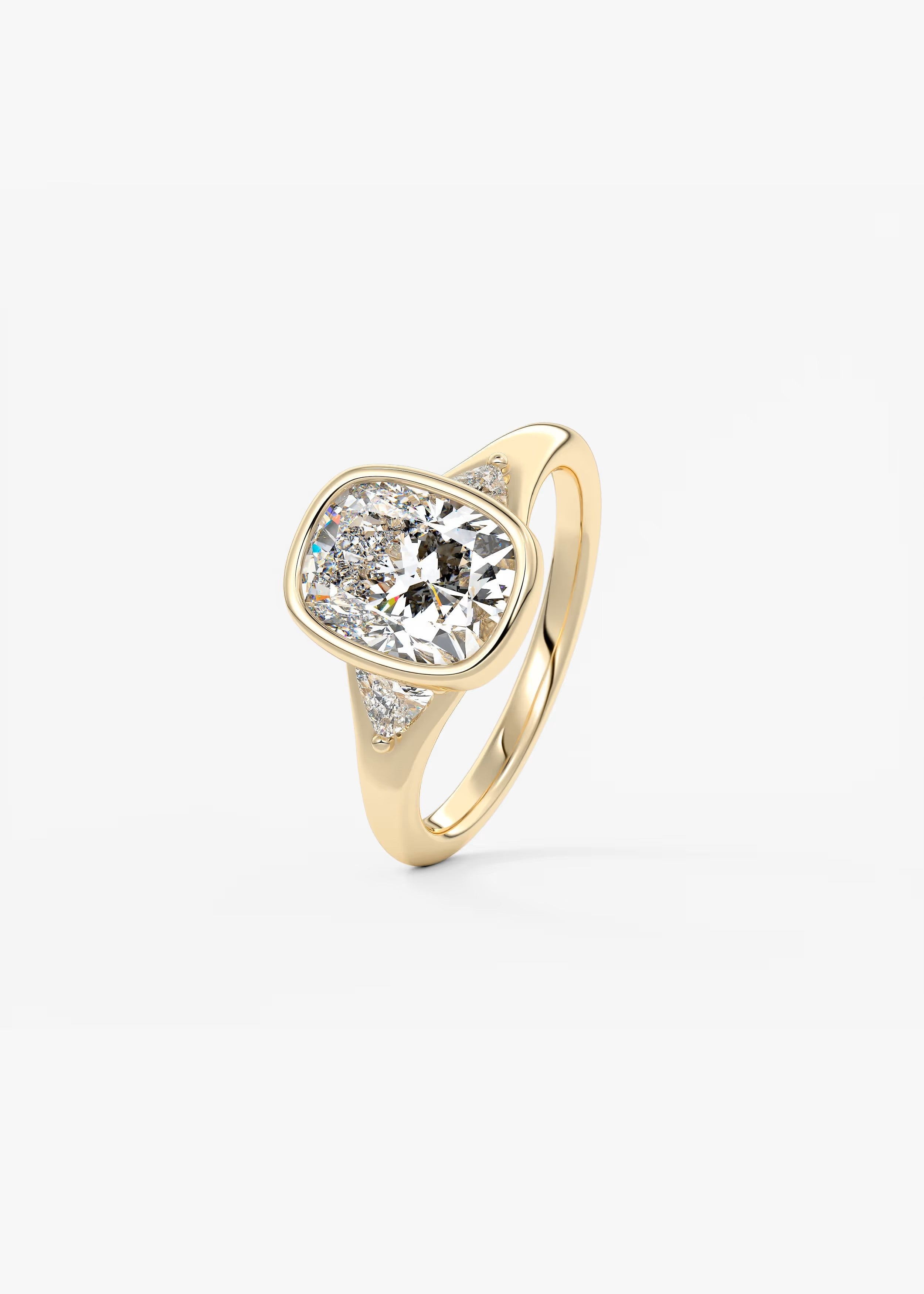 Véda Trilogy – Cushion with Trillion Side Stone Split Shank Engagement Ring