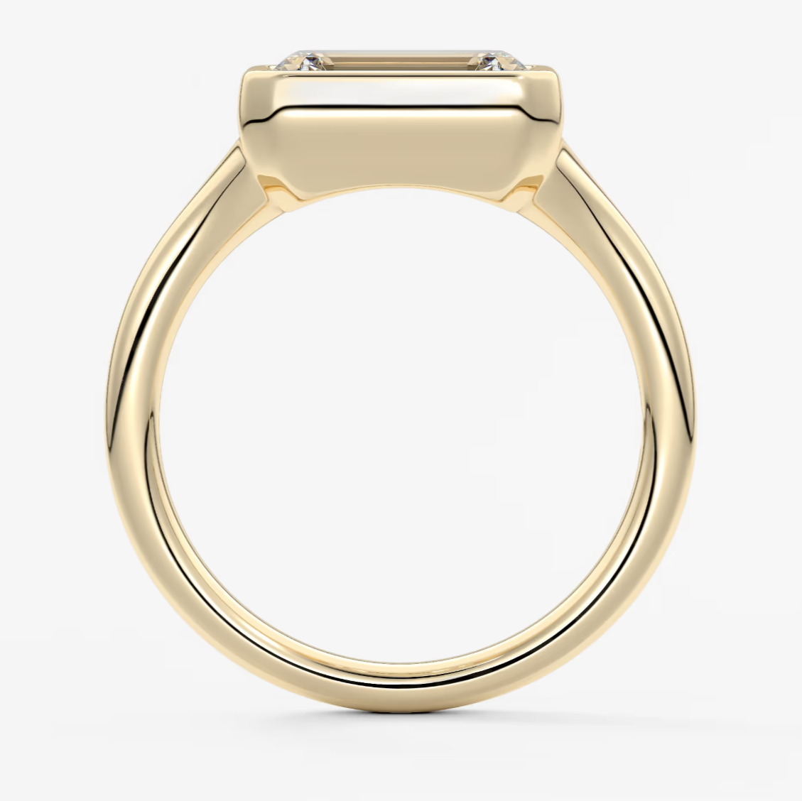 18k yellow gold emerald cut diamond engagement ring.