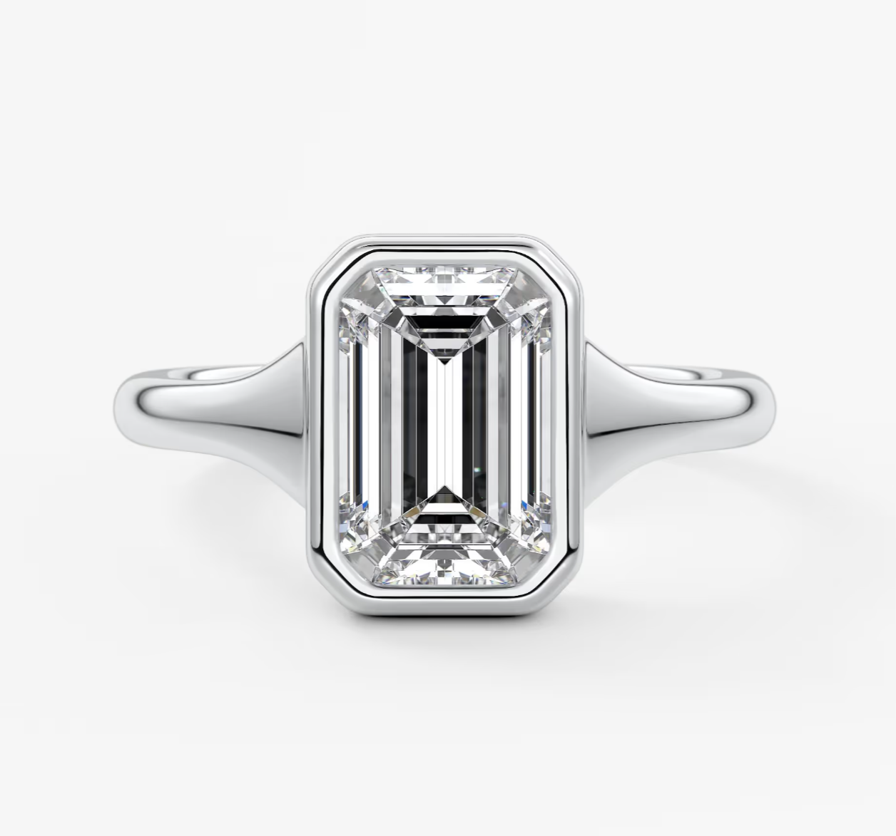 18k white gold emerald cut diamond engagement ring.