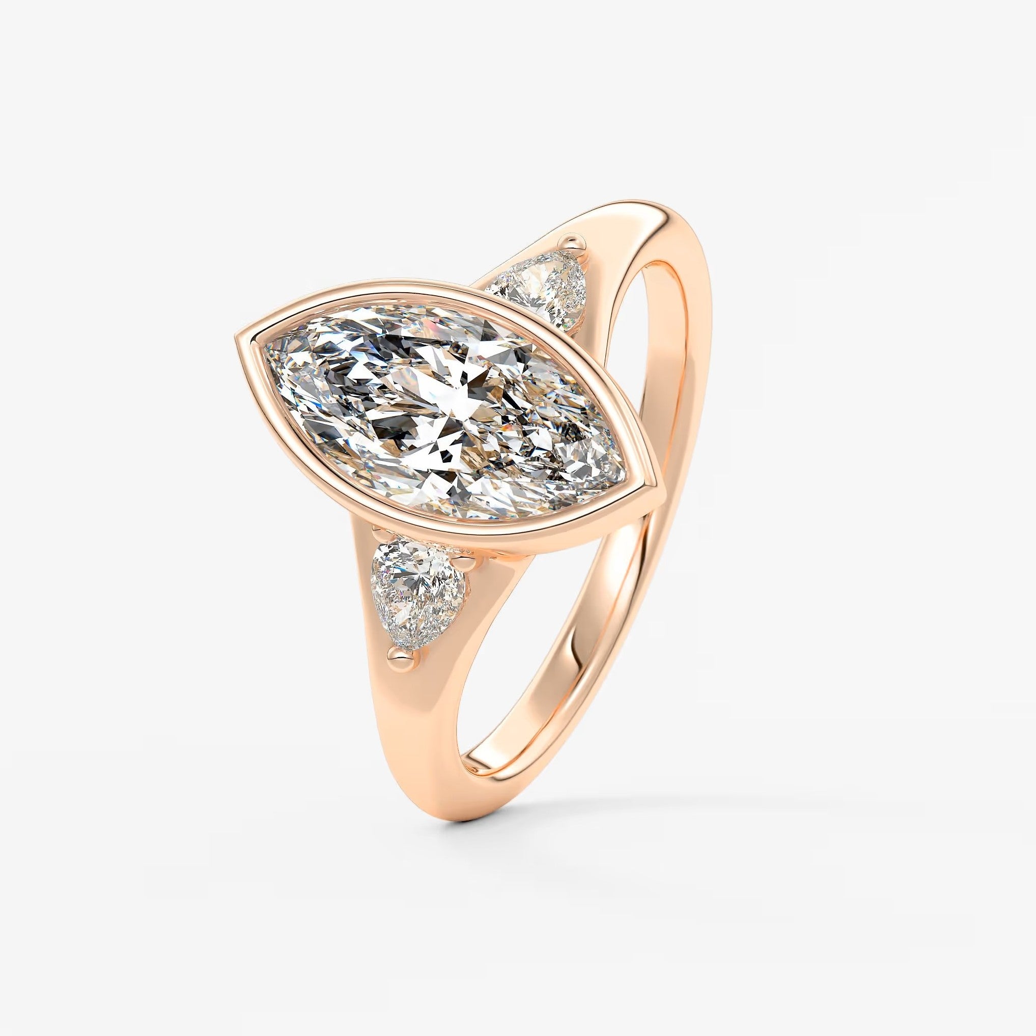 Véda trilogy – marquise with pear side stones