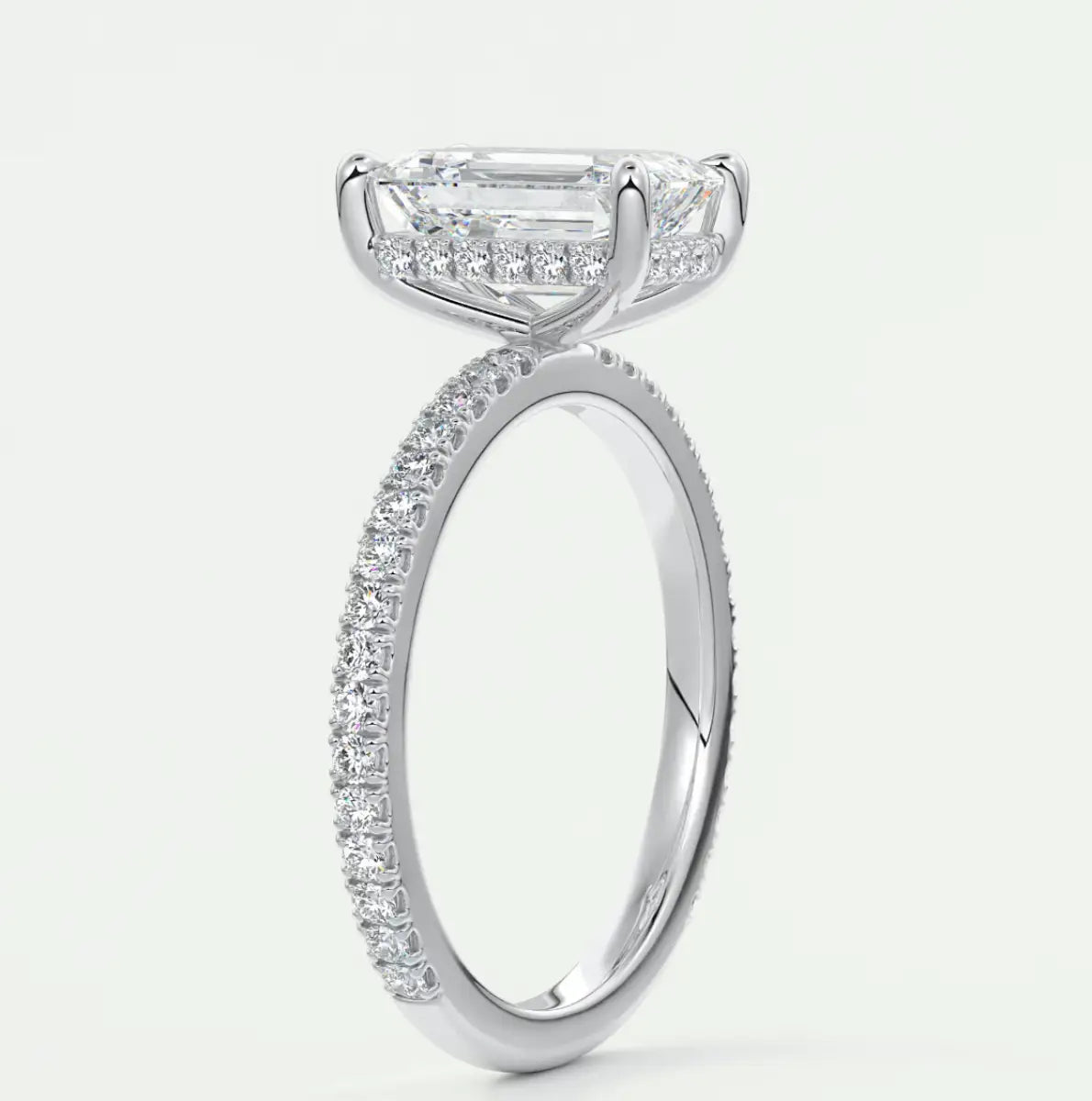 Custom made amelie emerald hidden halo engagement ring | diamond lab