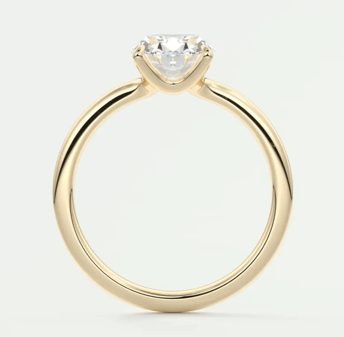 18k yellow gold engagement ring with a princess cut diamond.