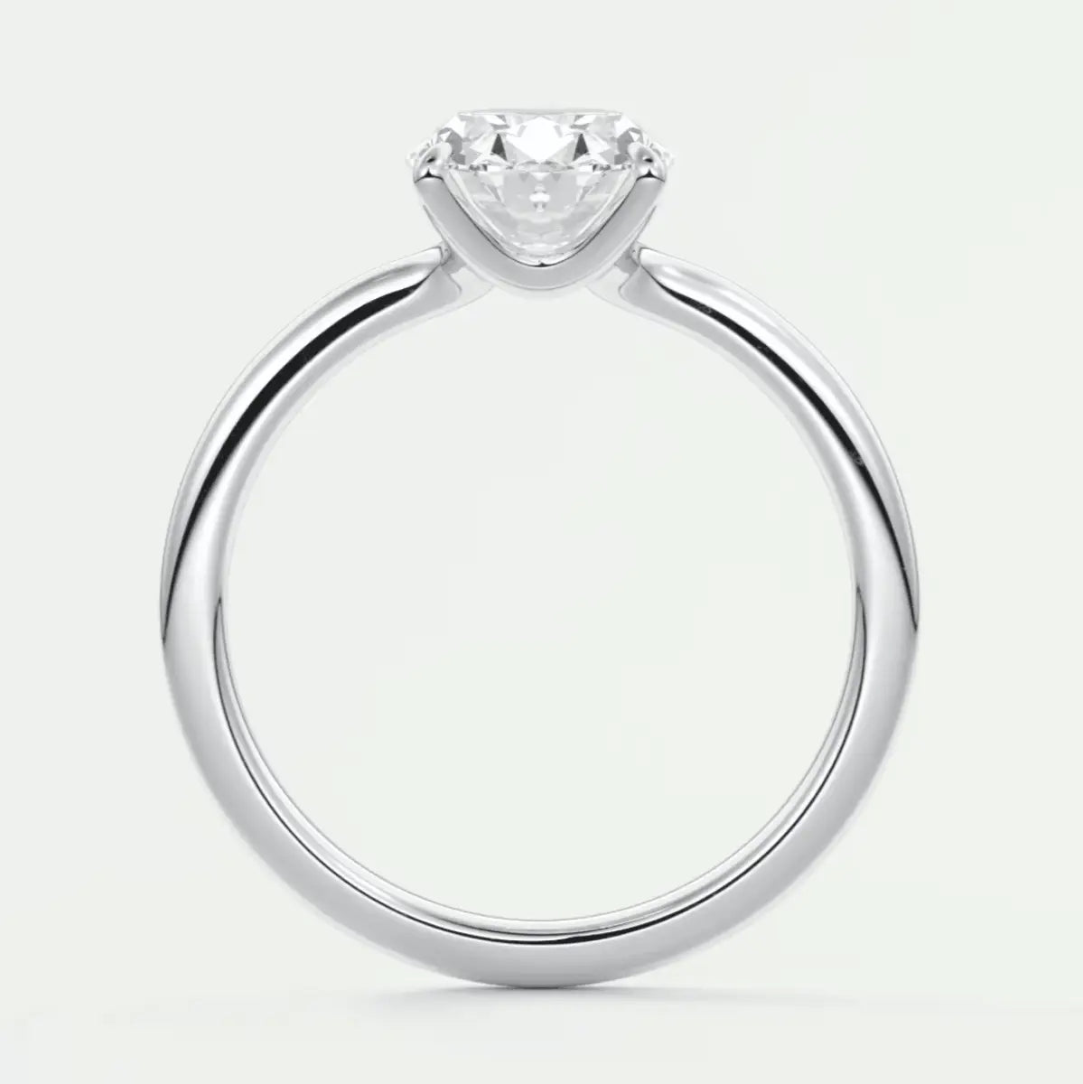 18k white gold solitaire diamond engagement ring.
