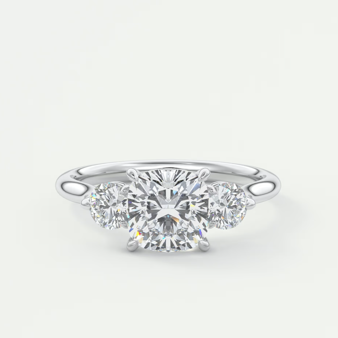 Custom made aveline cushion cathedral three-stone engagement ring | diamond lab