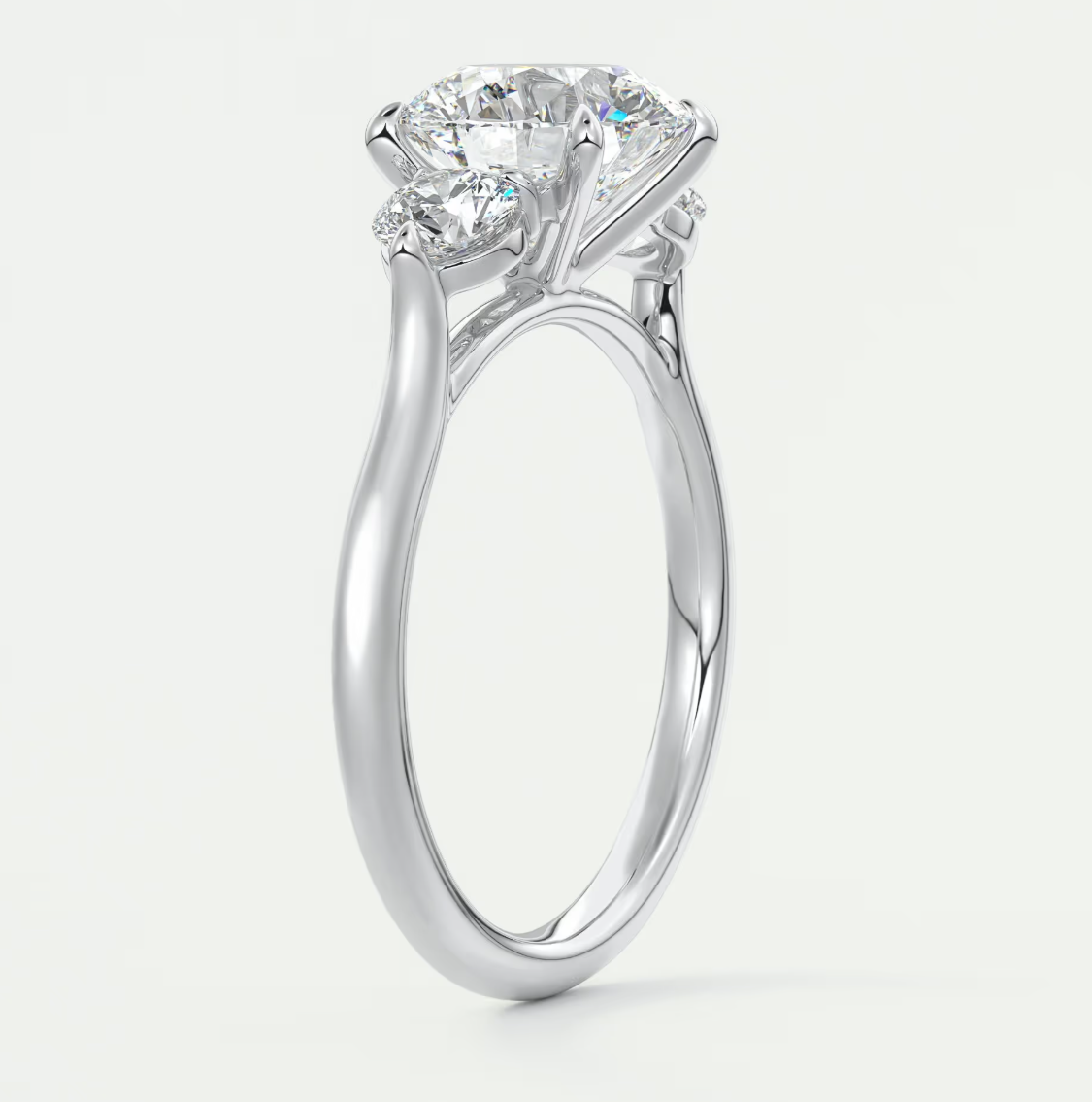 Custom made aveline round cathedral three-stone engagement ring | diamond lab