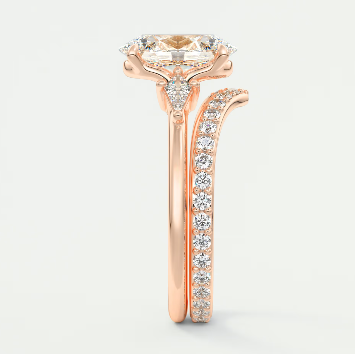 Custom made elysian oval three-stone engagement ring with kite side stones | diamond lab