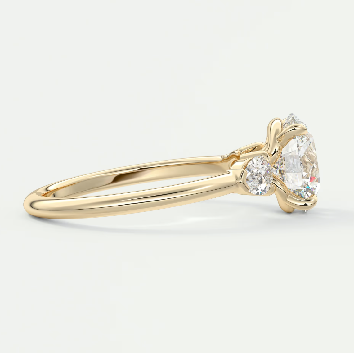 Custom made elysian round three-stone engagement ring with pear side stones | diamond lab