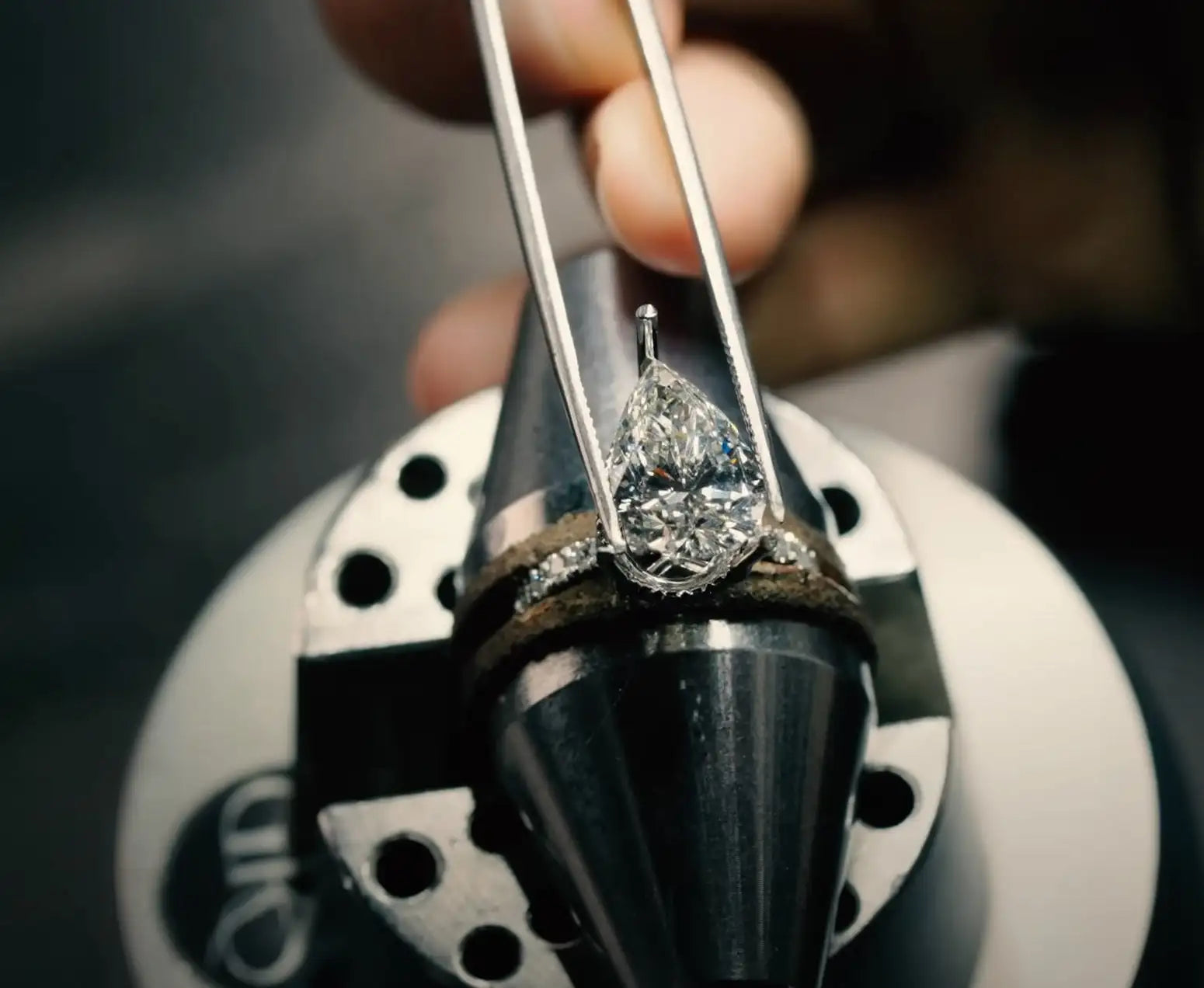 crafting an engagement ring with pear shape diamond