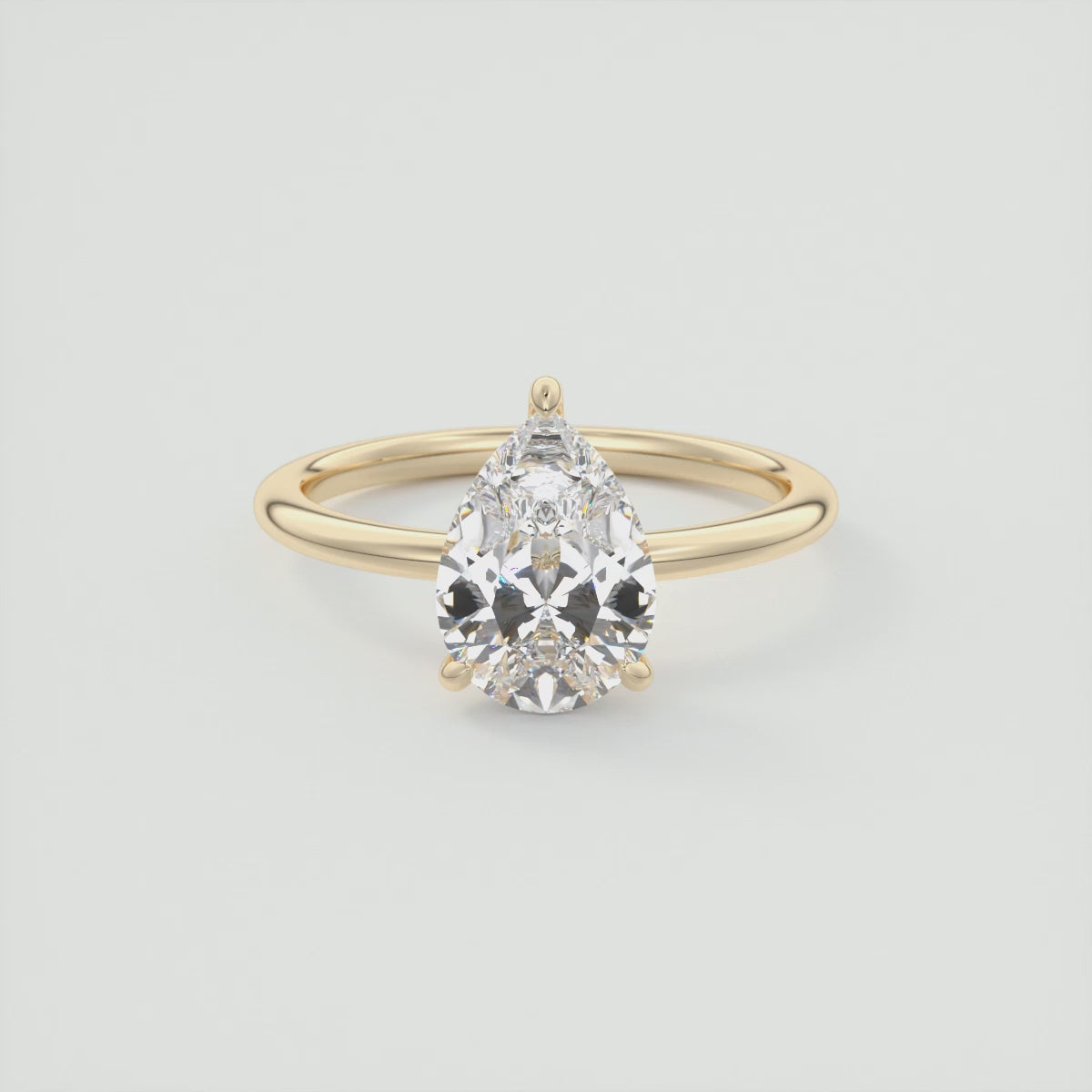 Celestia Pear Hidden Halo Ring – Lab Diamond or Moissanite