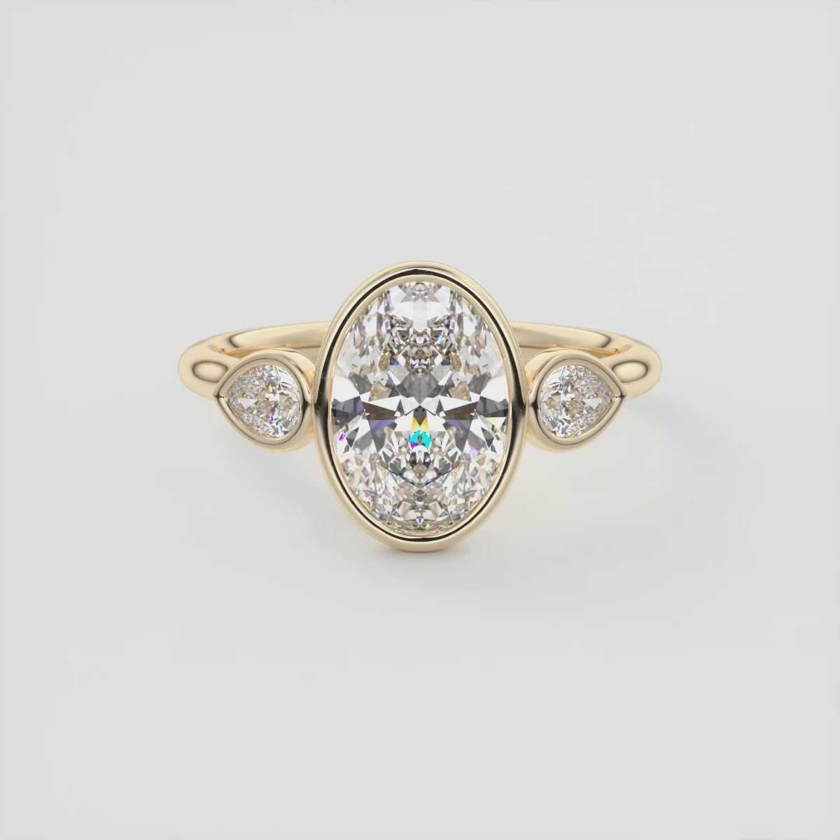 Véda Oval Bezel Three-Stone Engagement Ring – Lab Diamond or Moissanite