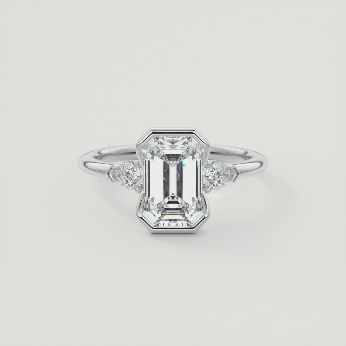 Solara Emerald Half Bezel Three-Stone Engagement Ring