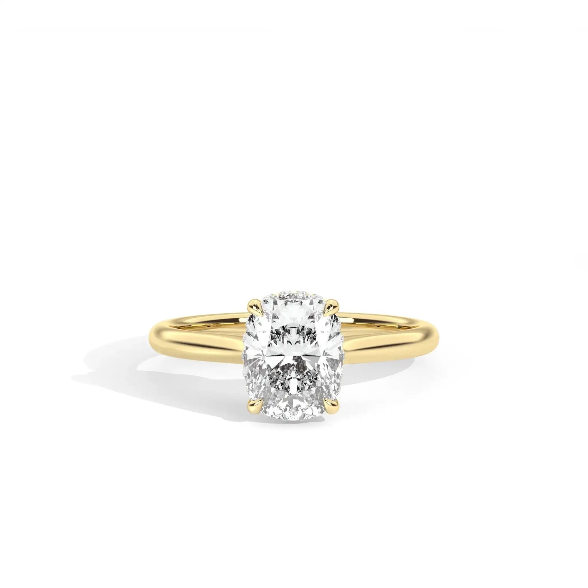 Gold ring with a diamond on a white background