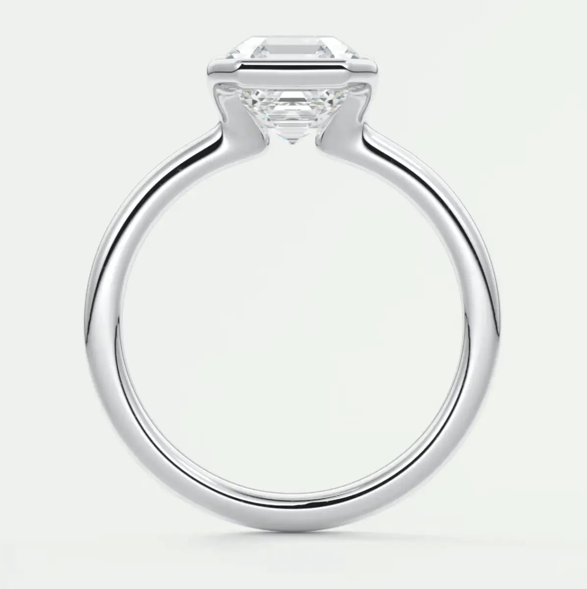 18-karat white gold engagement ring with a princess-cut diamond.