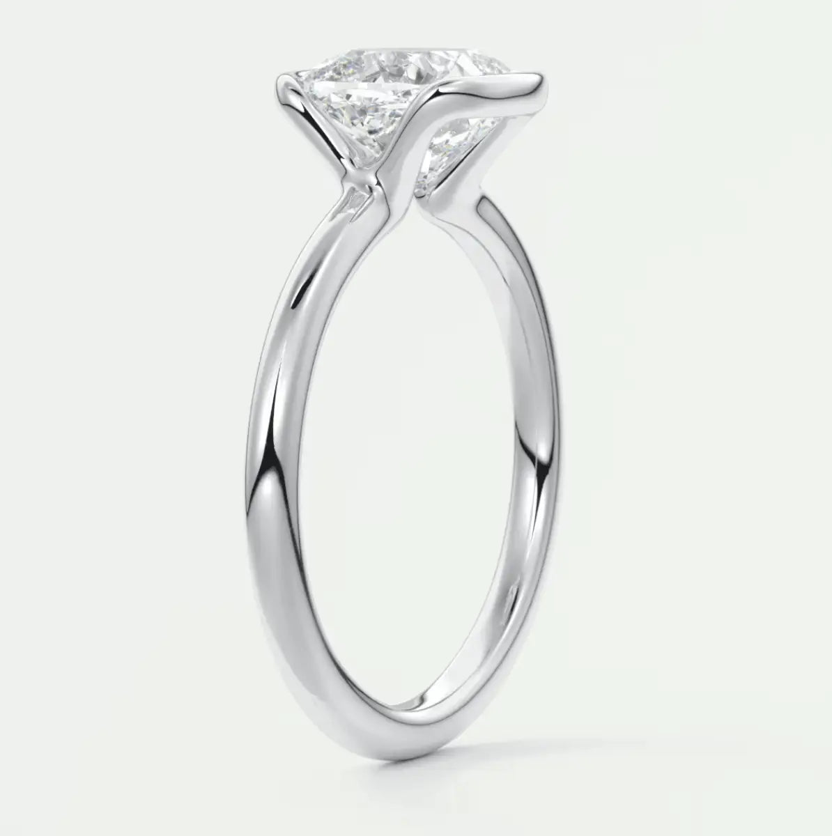 Princess cut diamond engagement ring in white gold.