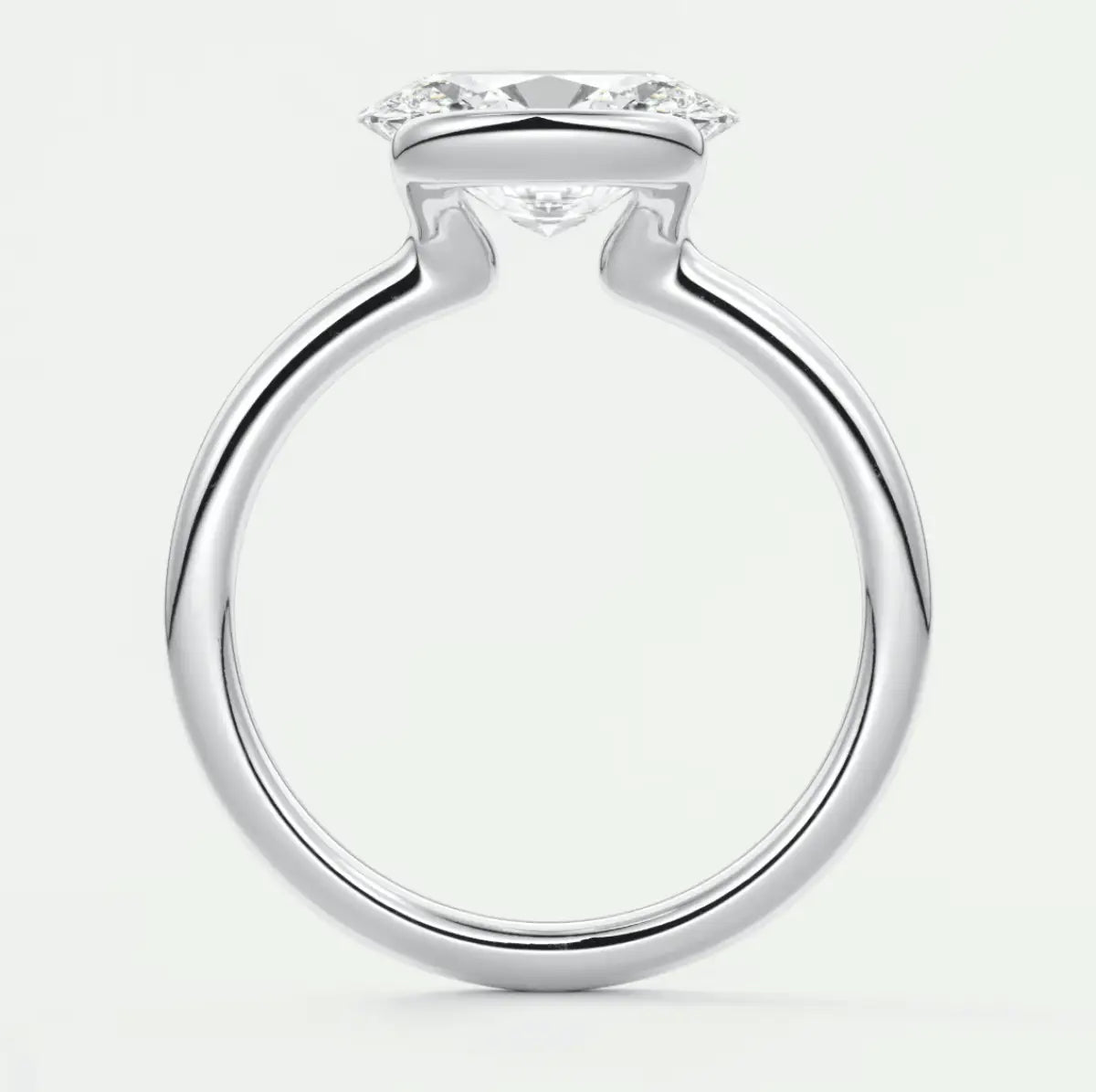 White gold engagement ring with a princess cut diamond.