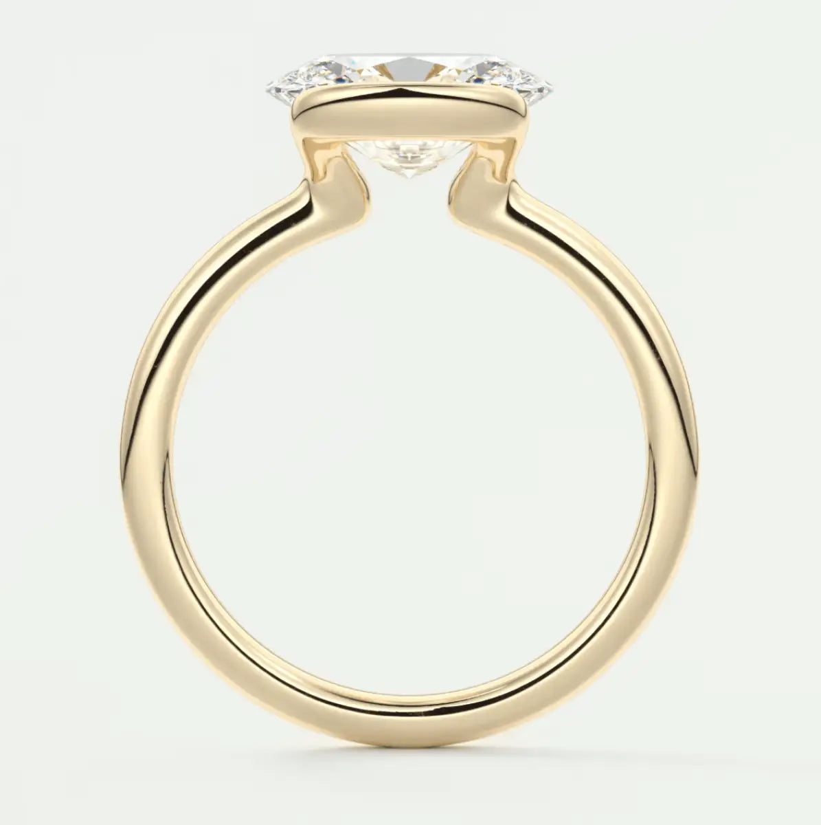18k yellow gold engagement ring with a princess cut diamond.