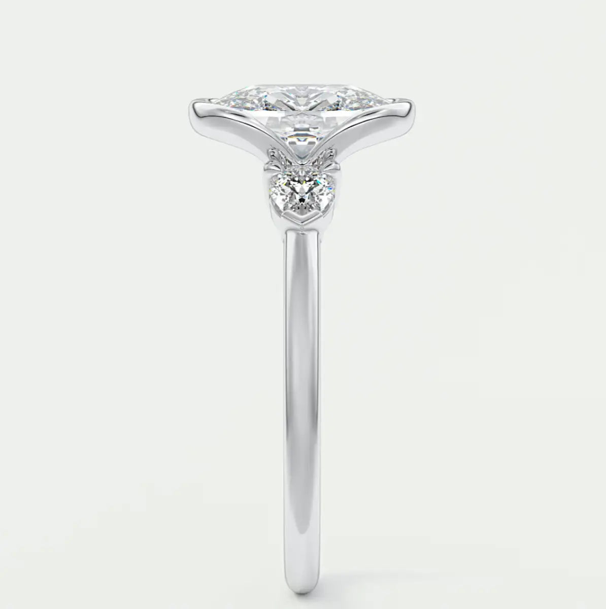 Custom made solara elongated cushion half bezel three-stone engagement ring | diamond lab