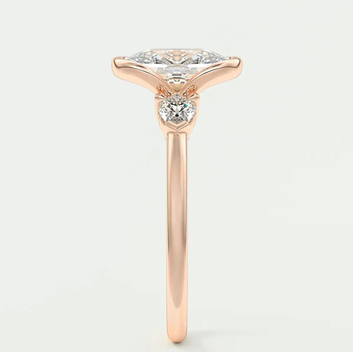 Custom made solara elongated cushion half bezel three-stone engagement ring | diamond lab