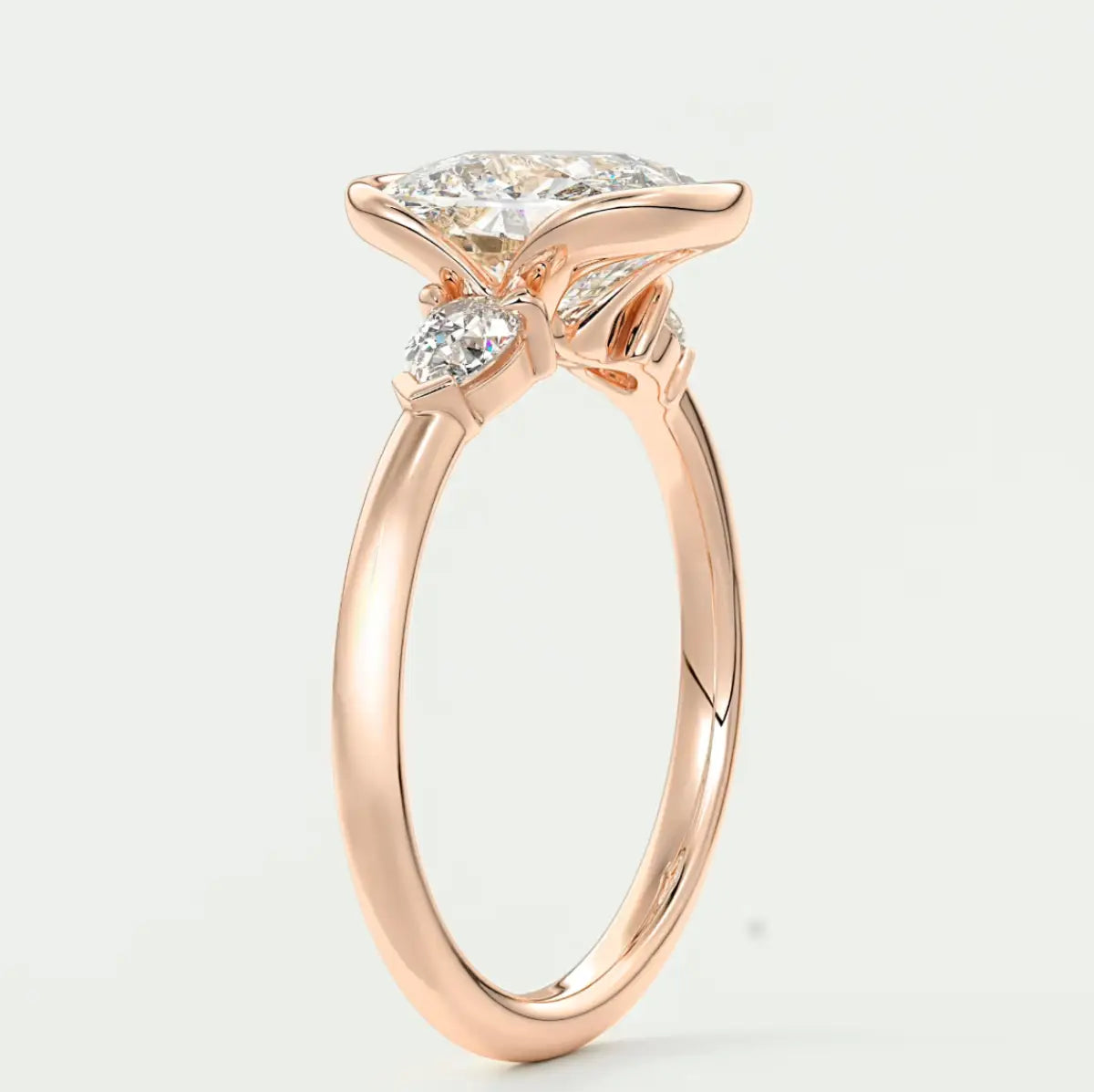 Custom made solara elongated cushion half bezel three-stone engagement ring | diamond lab