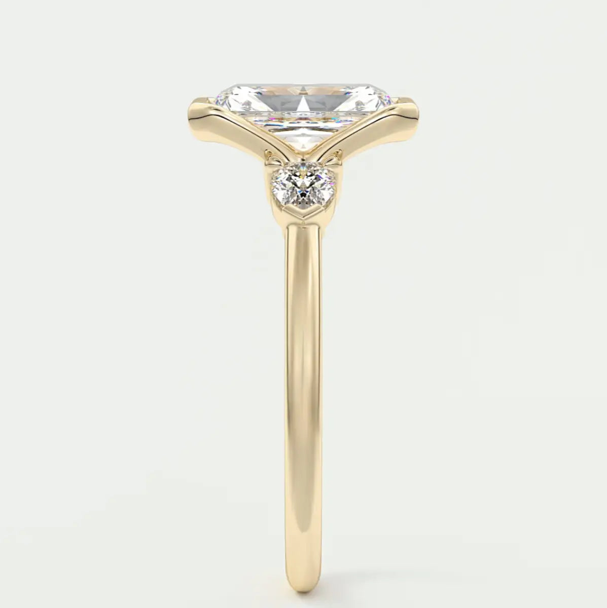 Custom made solara elongated radiant half bezel three-stone engagement ring | diamond lab