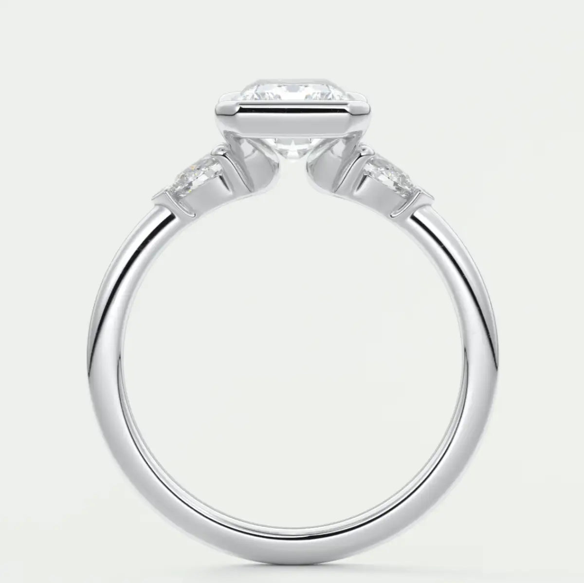 Custom made solara elongated radiant half bezel three-stone engagement ring | diamond lab