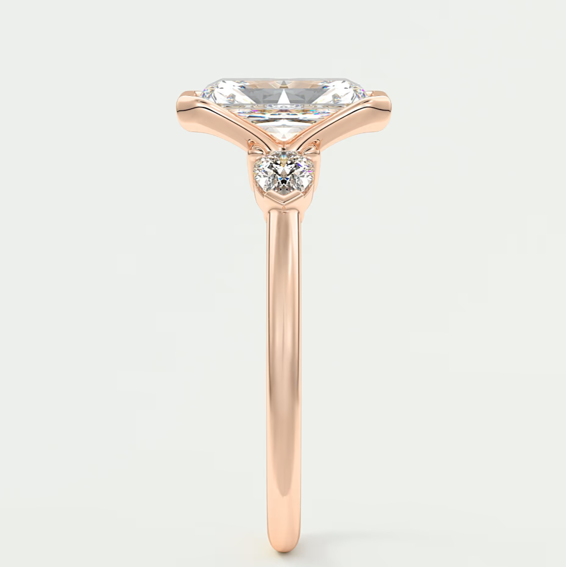 Custom made solara elongated radiant half bezel three-stone engagement ring | diamond lab