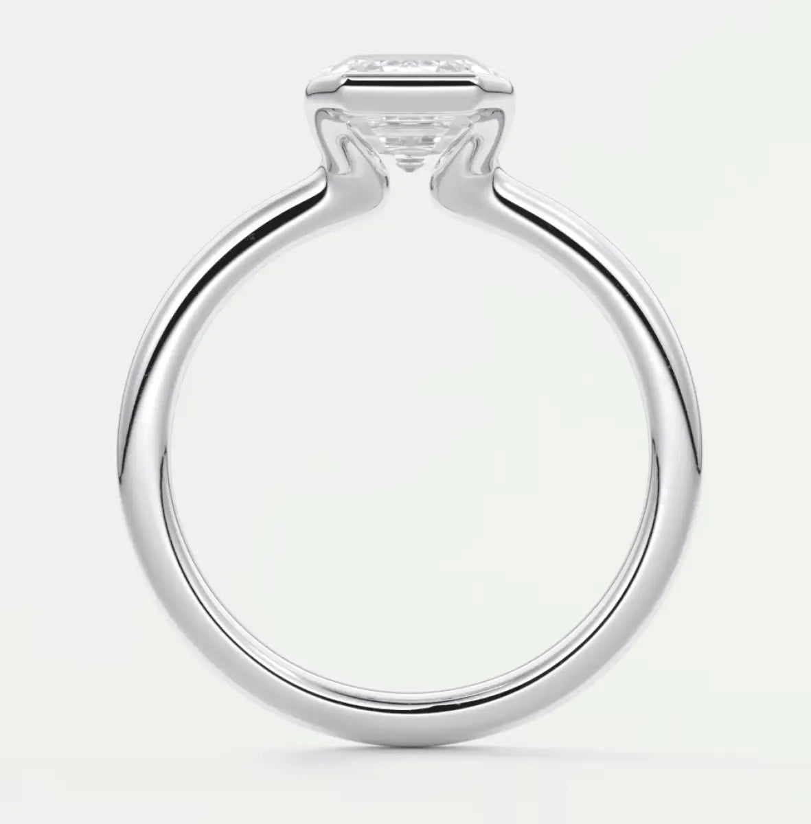 White gold engagement ring with a square diamond center stone and curved band design.