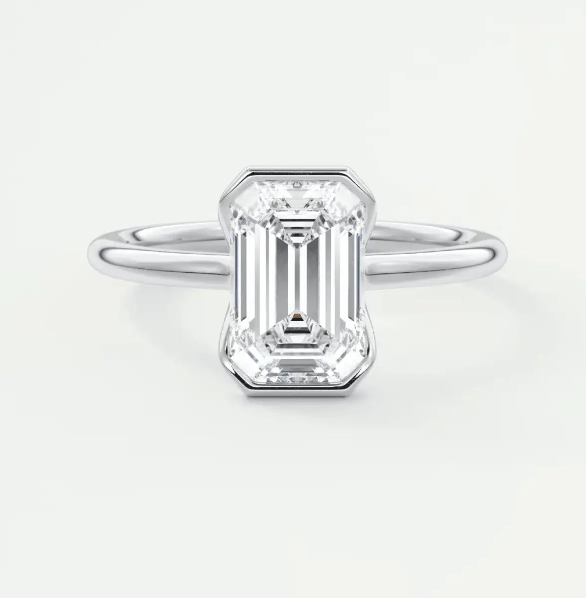 18k white gold emerald cut diamond engagement ring.