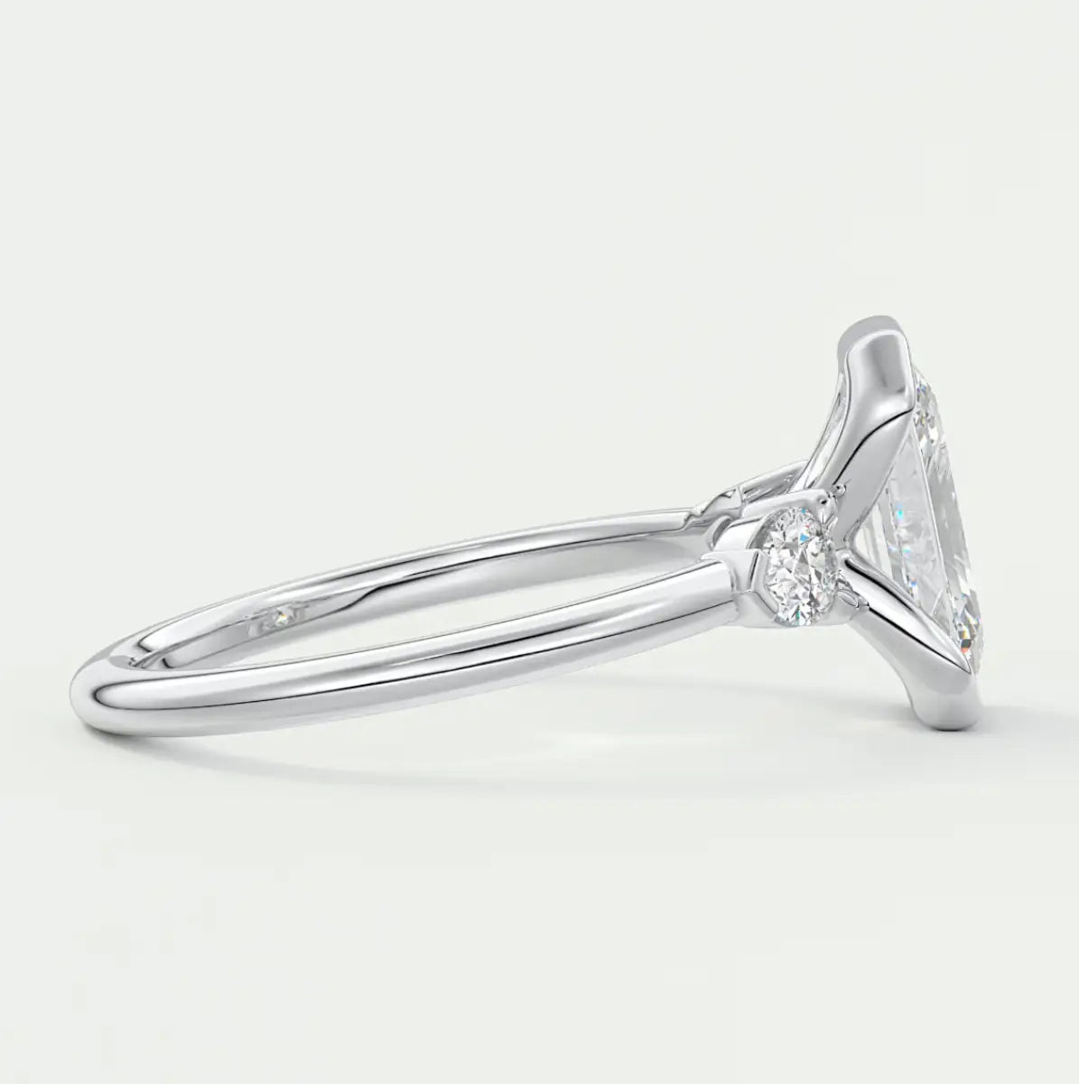 Custom made solara emerald half bezel three-stone engagement ring | diamond lab