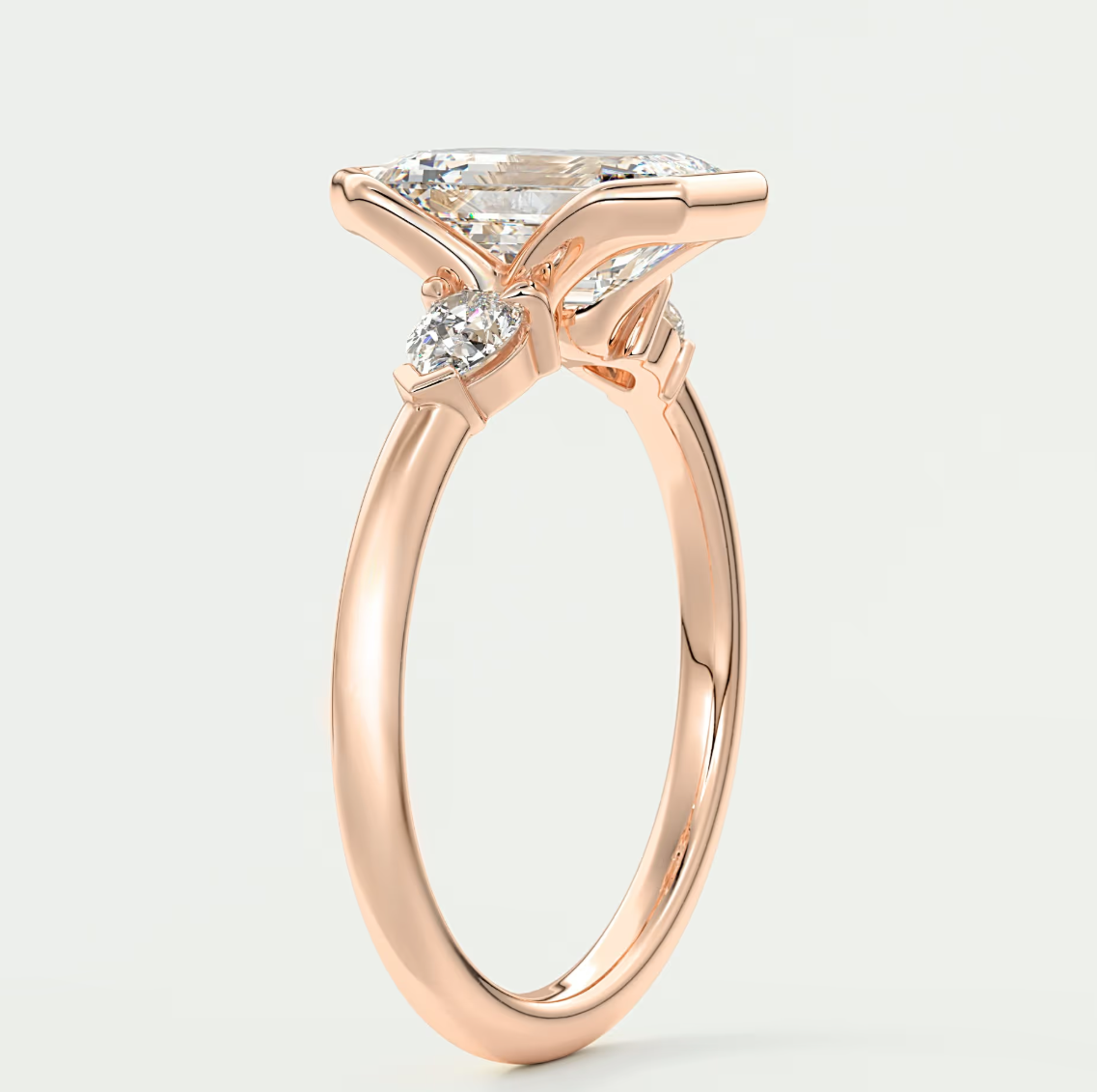 Custom made solara emerald half bezel three-stone engagement ring | diamond lab