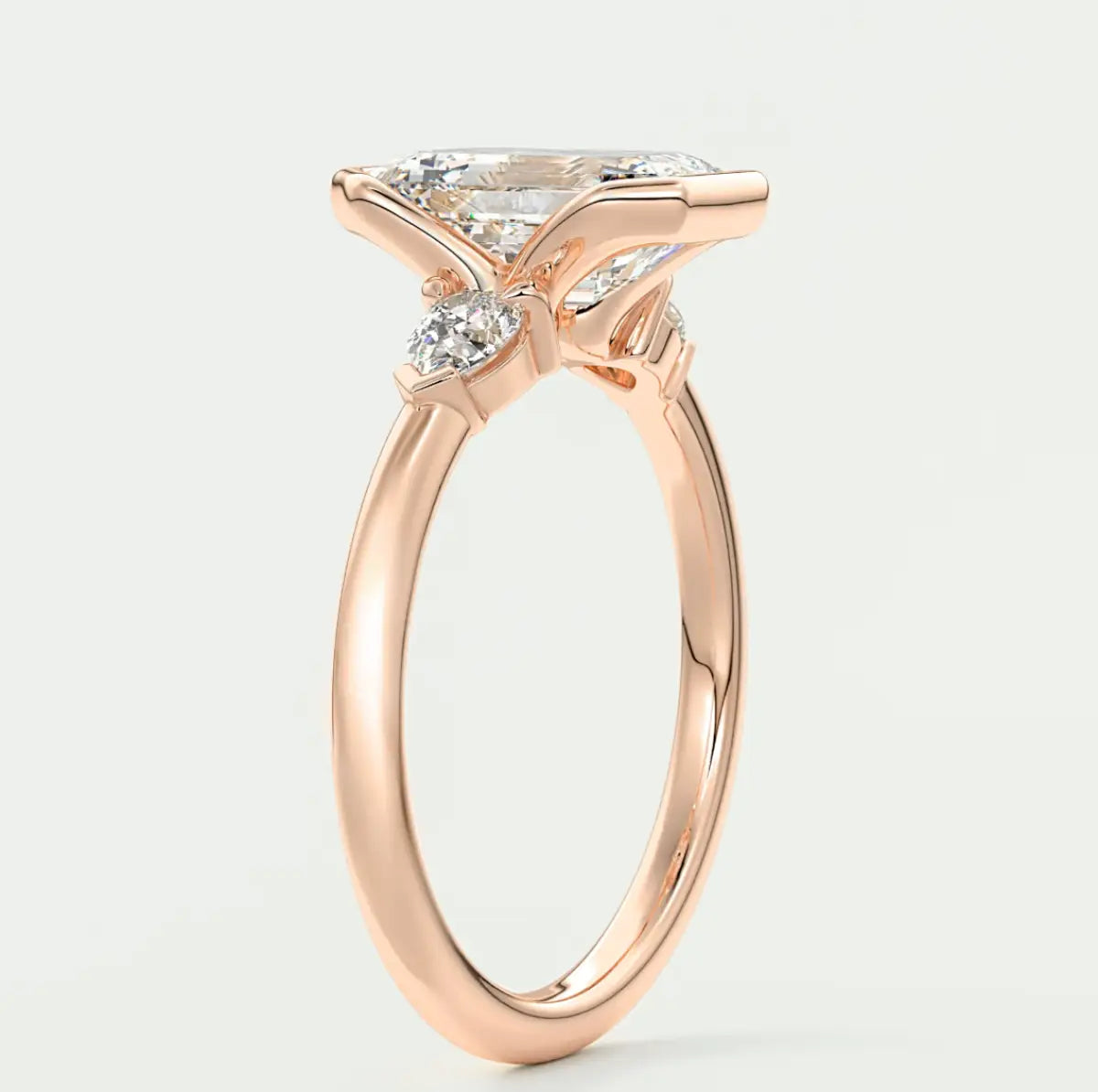 Custom made solara emerald half bezel three-stone engagement ring | diamond lab