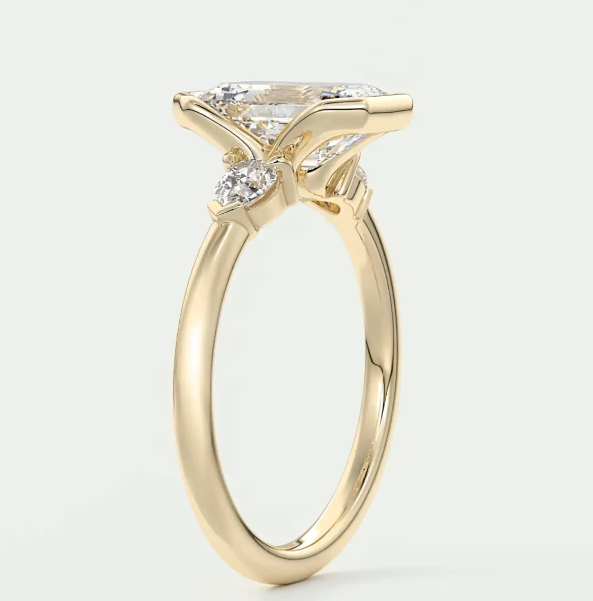 Custom made solara emerald half bezel three-stone engagement ring | diamond lab